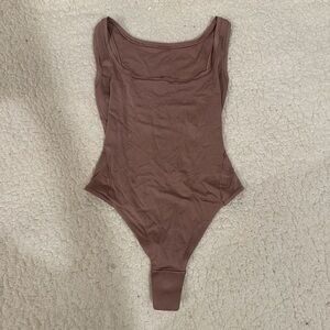 lululemon body suit, brown-ish tan size 0